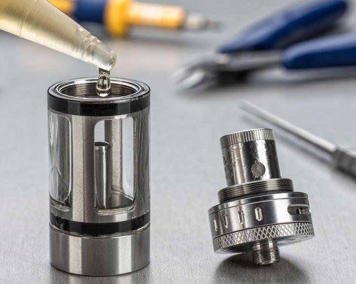 Proper vape pod coil priming and soaking techniques
